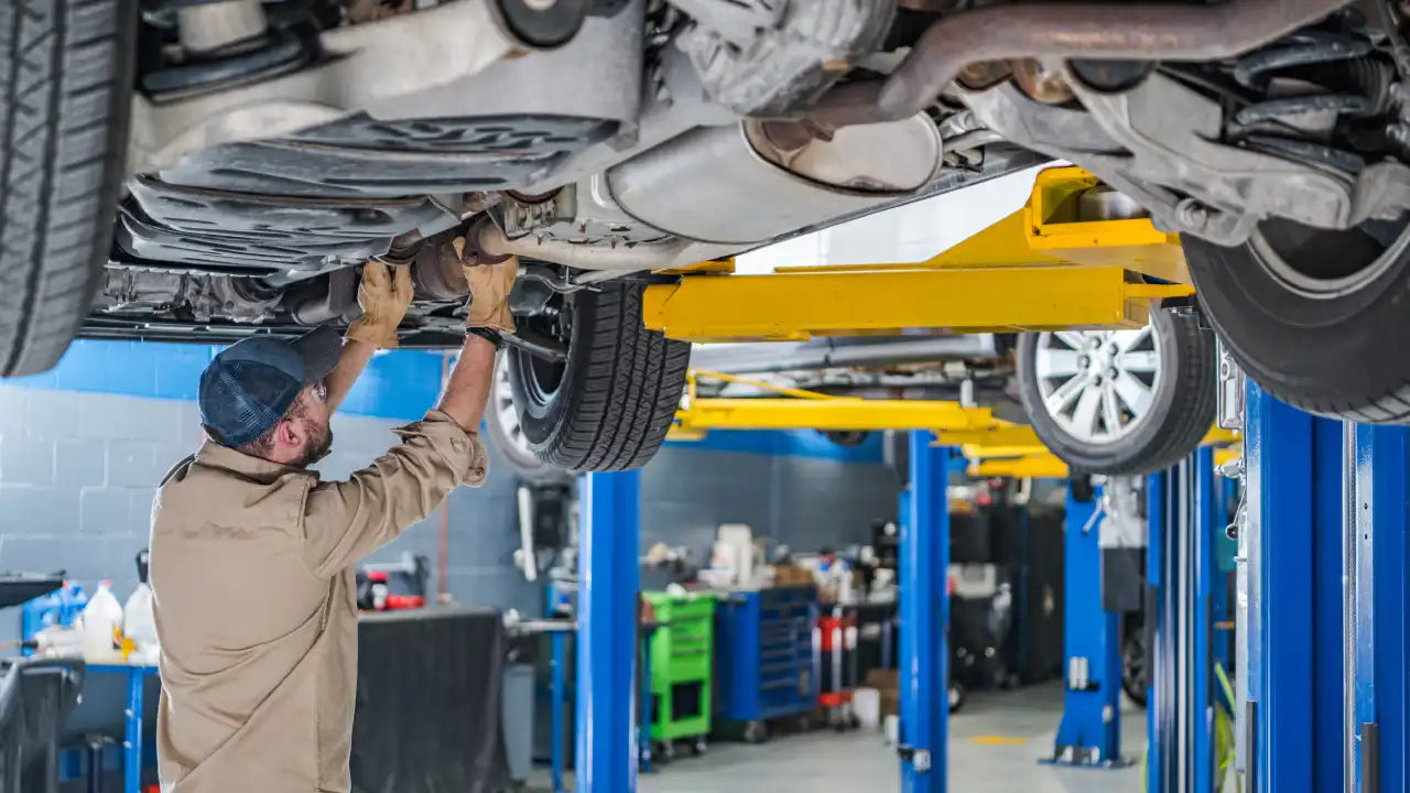 2 post automotive vehicle lift