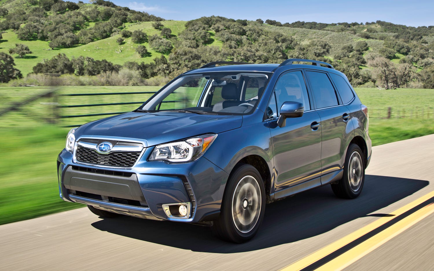 2014 subaru forester xt front three quarters in motion1