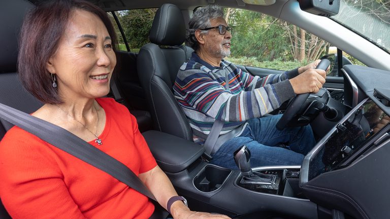 Adult couple driving in a car