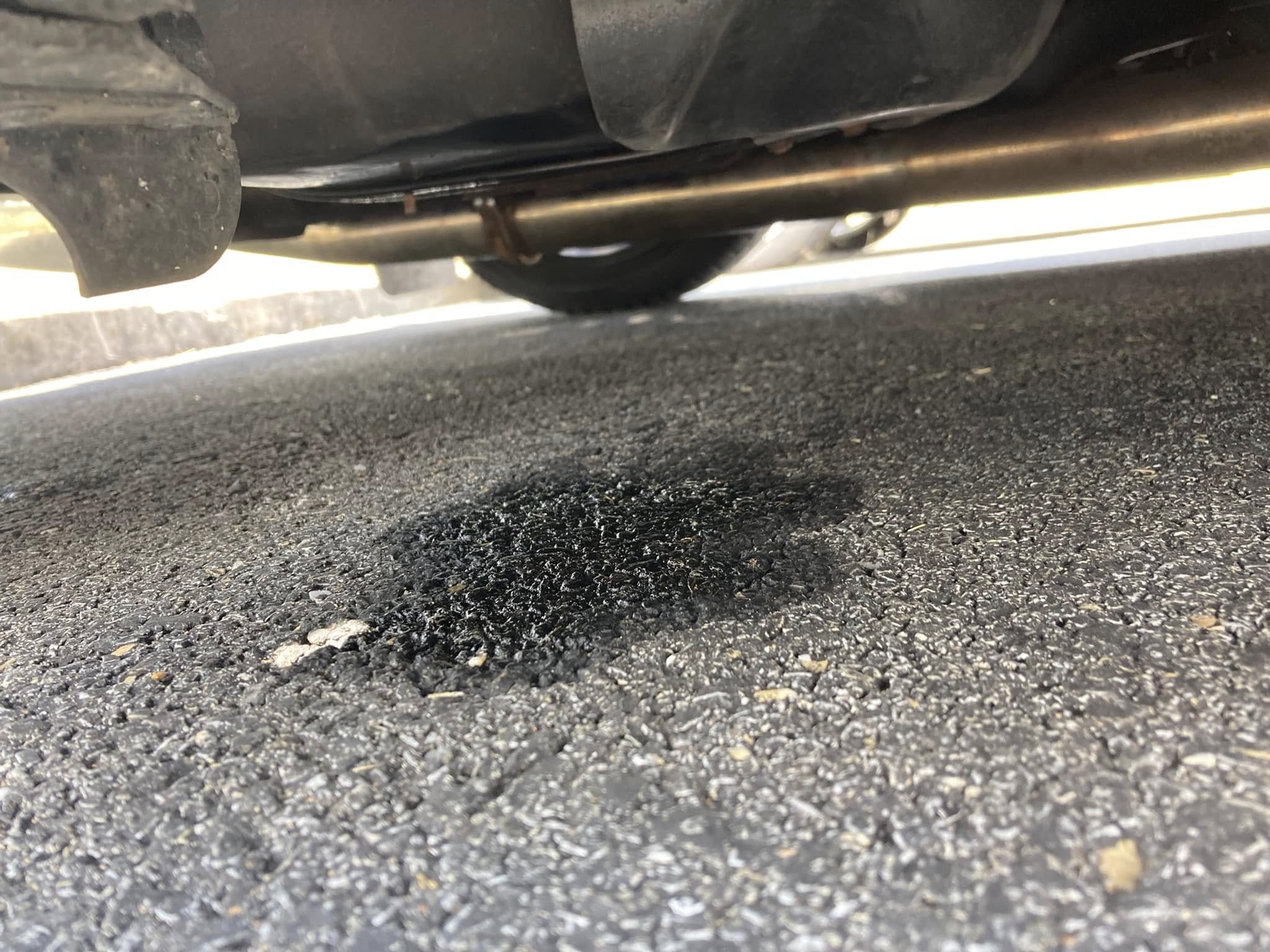 Raw gasoline from underneath the vehicle