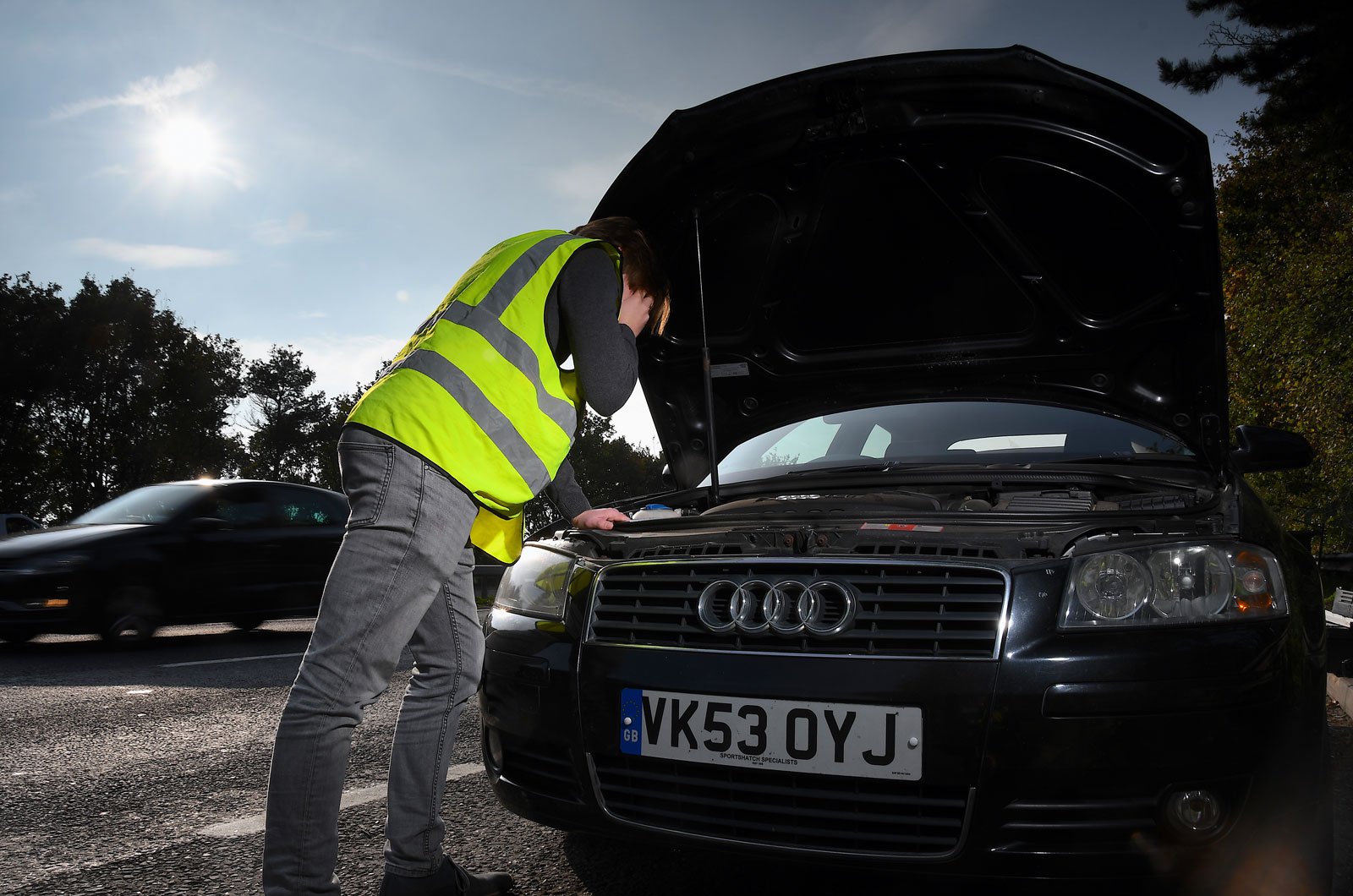 Black Audi experiencing mechanical issues Black Audi experiencing mechanical issues
