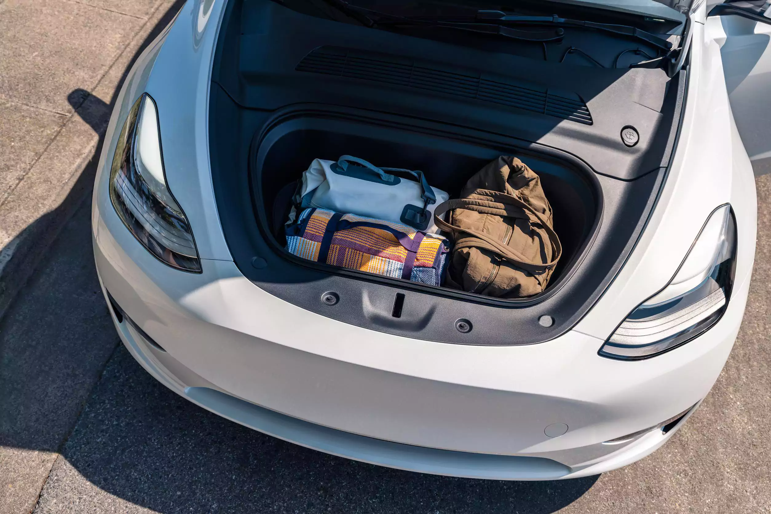 Tesla Model Y frunk space Tesla Model Y frunk space