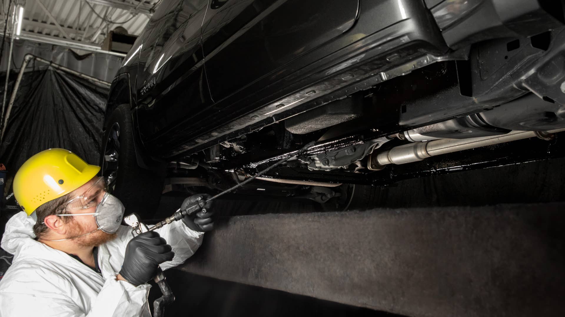 Undercoating a car