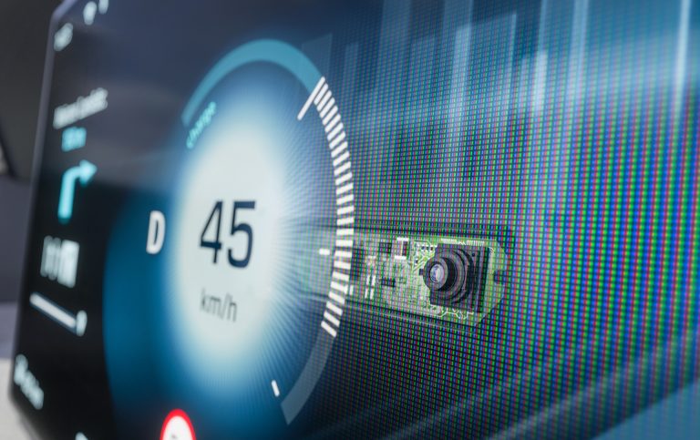 A futuristic dashboard of a car is shown