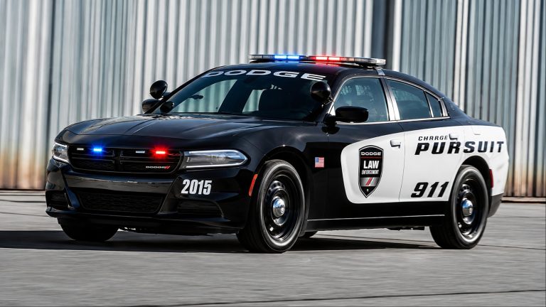 2015 Dodge Charger police pursuit vehicle with flashing emergency lights