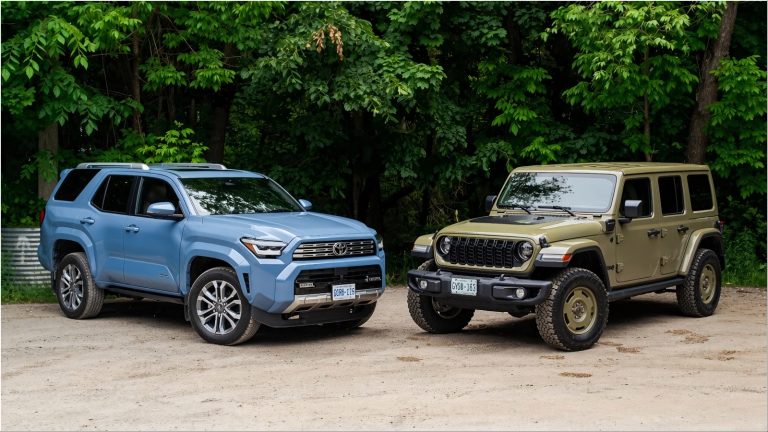 Blue Toyota 4Runner and olive Jeep Wrangler parked side-by-side outdoors