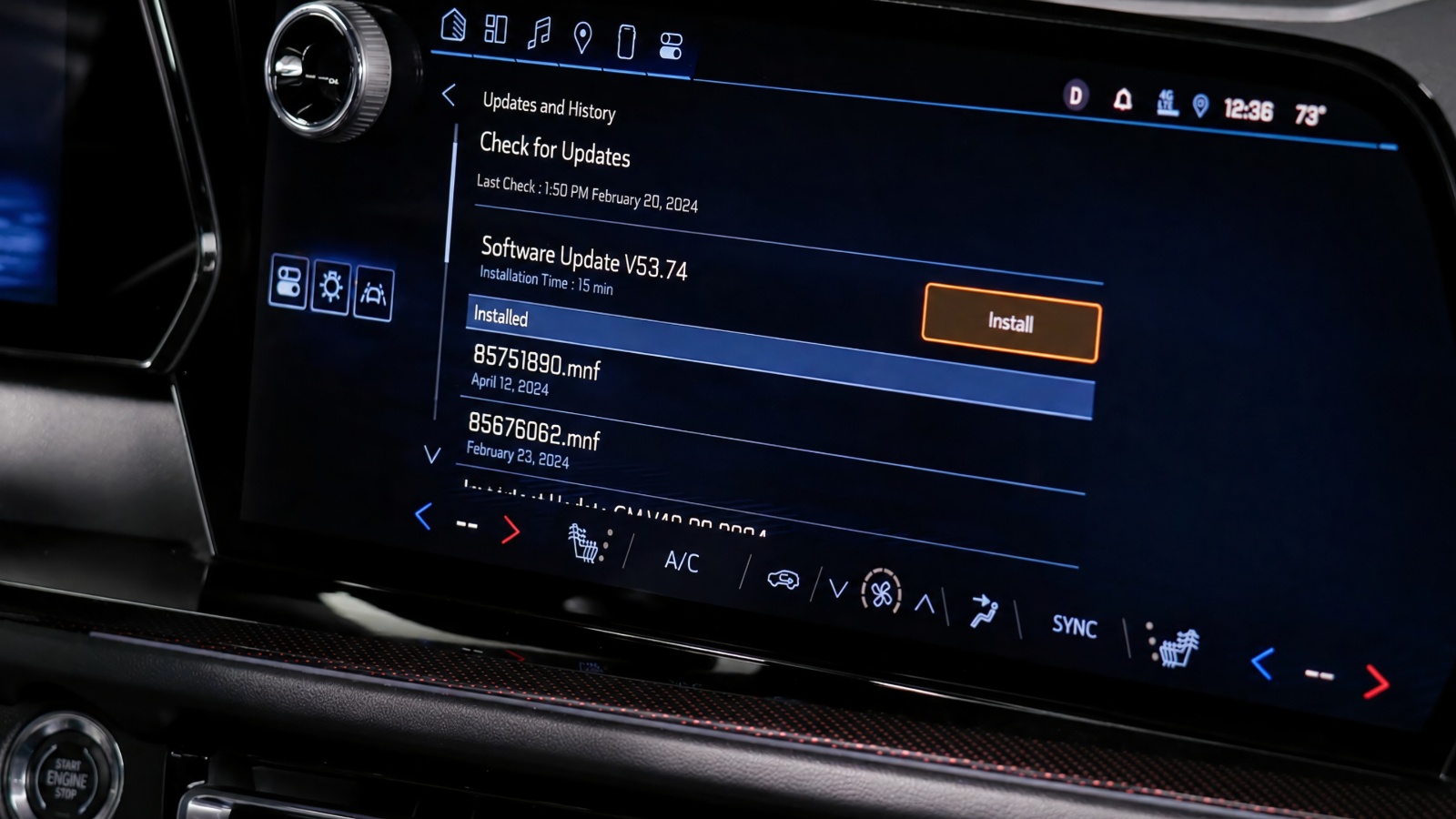 modern car infotainment touchscreen displaying software update and history menu options