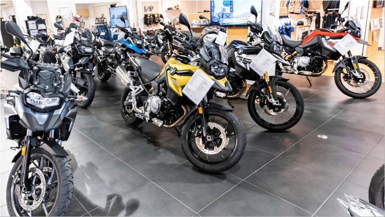 BMW GS motorcycles lined up in showroom display
