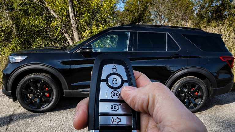 Modern SUV parked outdoors with smart key fob and keyless entry system