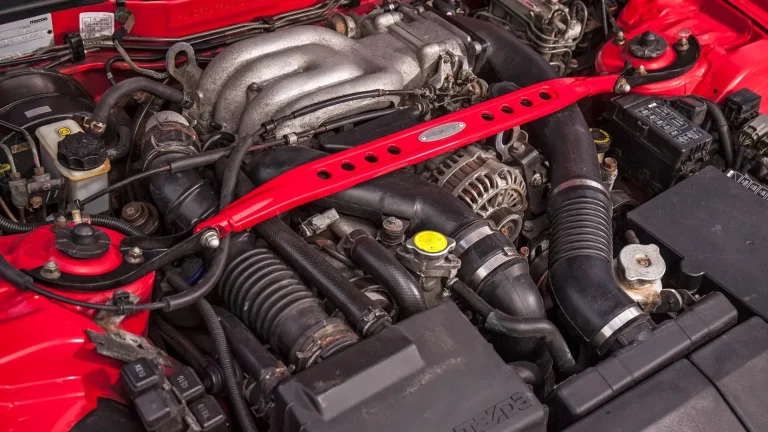 A red Rotary Engine is shown in the image