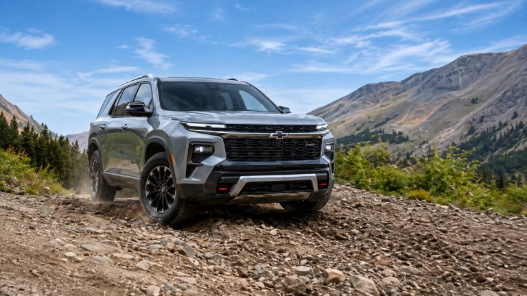 A Chevrolet Traverse on a rough patch on the outskirts