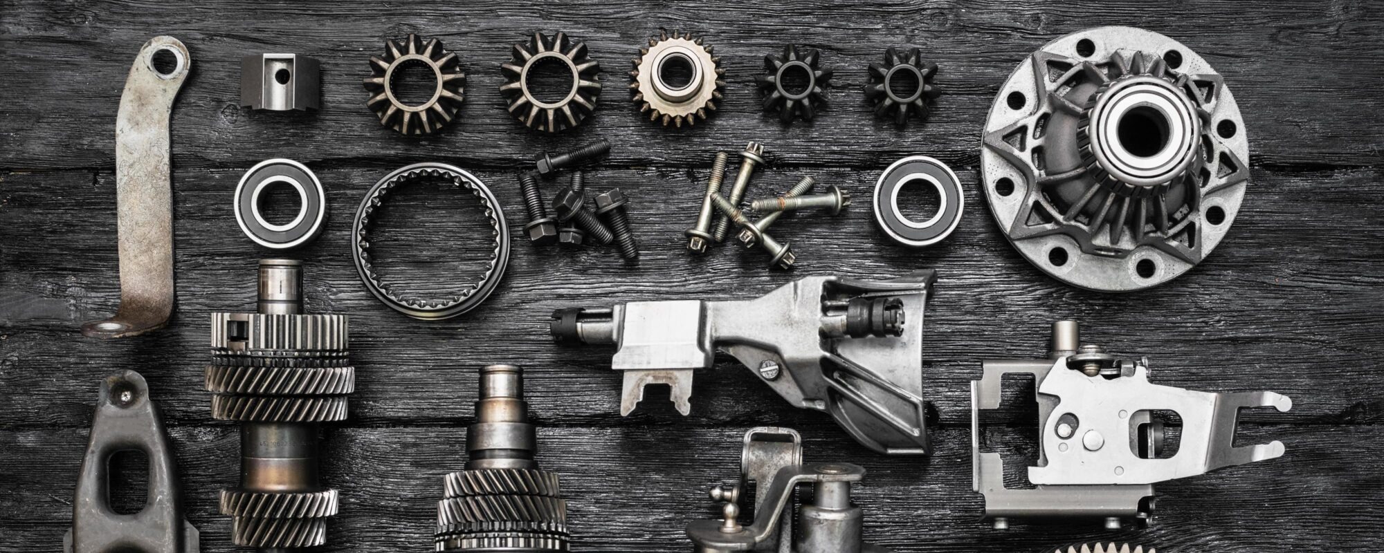 Disassembled car transmission and differential spare parts