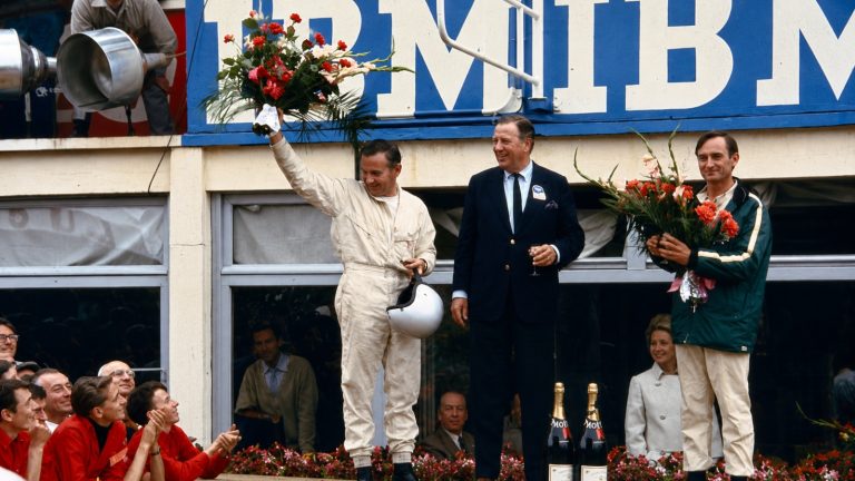 Ford's 1966 Le Mans podium celebrating the GT40's historic one-two-three finish