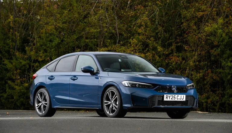 A Blue Honda Civic is cruising at highway