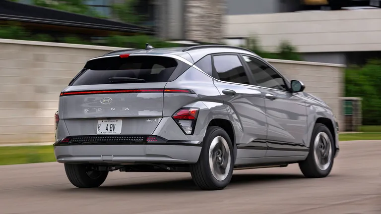 A Hyundai Kona Electric cruising at high speeds on the city road