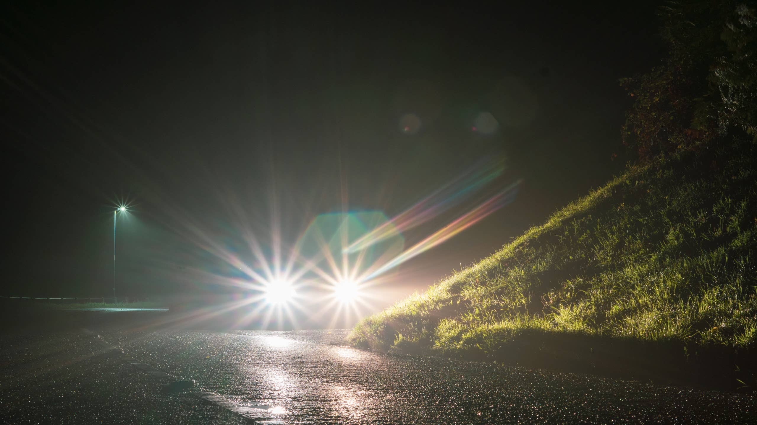 Intense glare from two car headlights