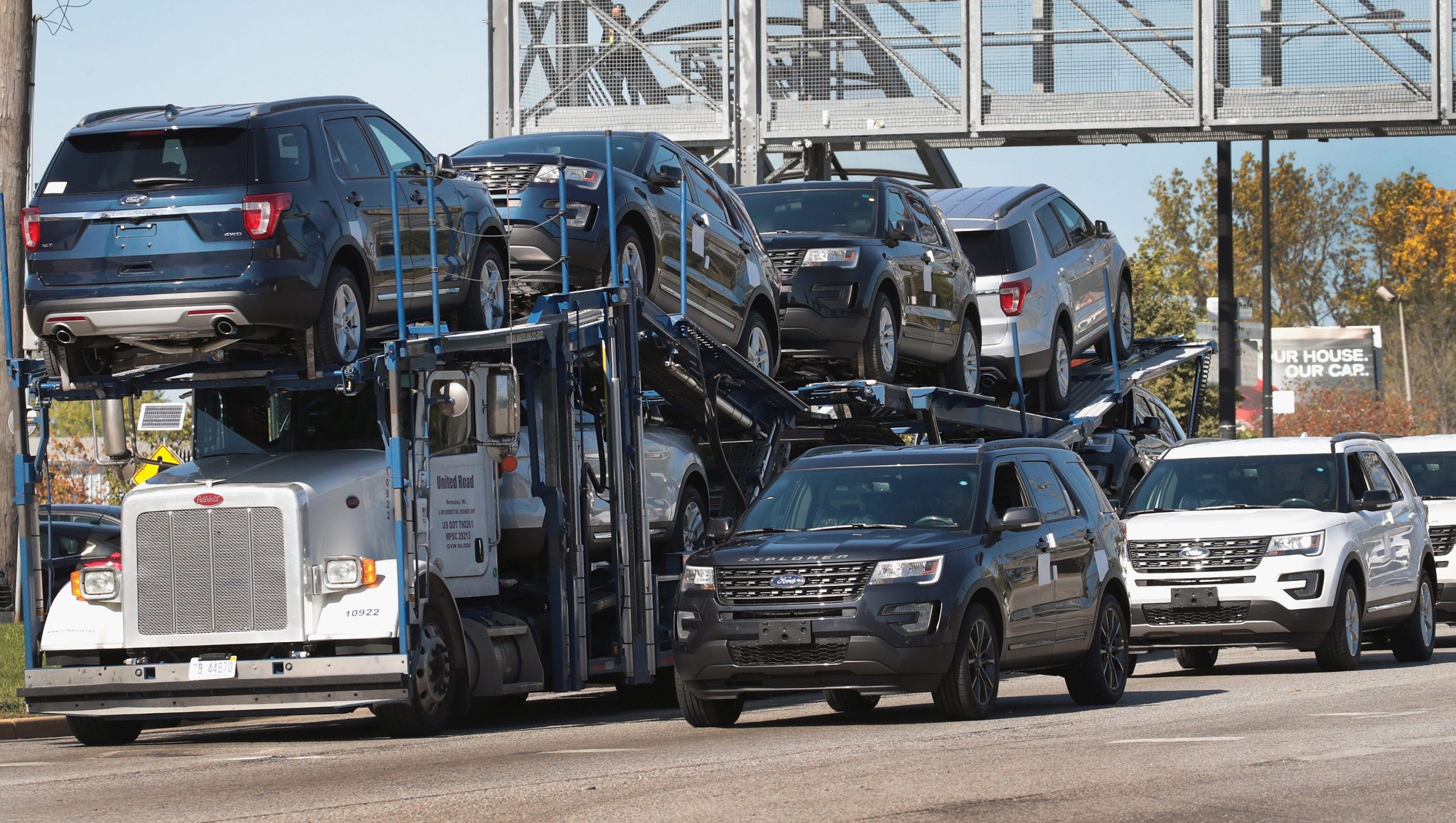 Peterbilt car carrier truck transporting several Peterbilt car carrier truck transporting several