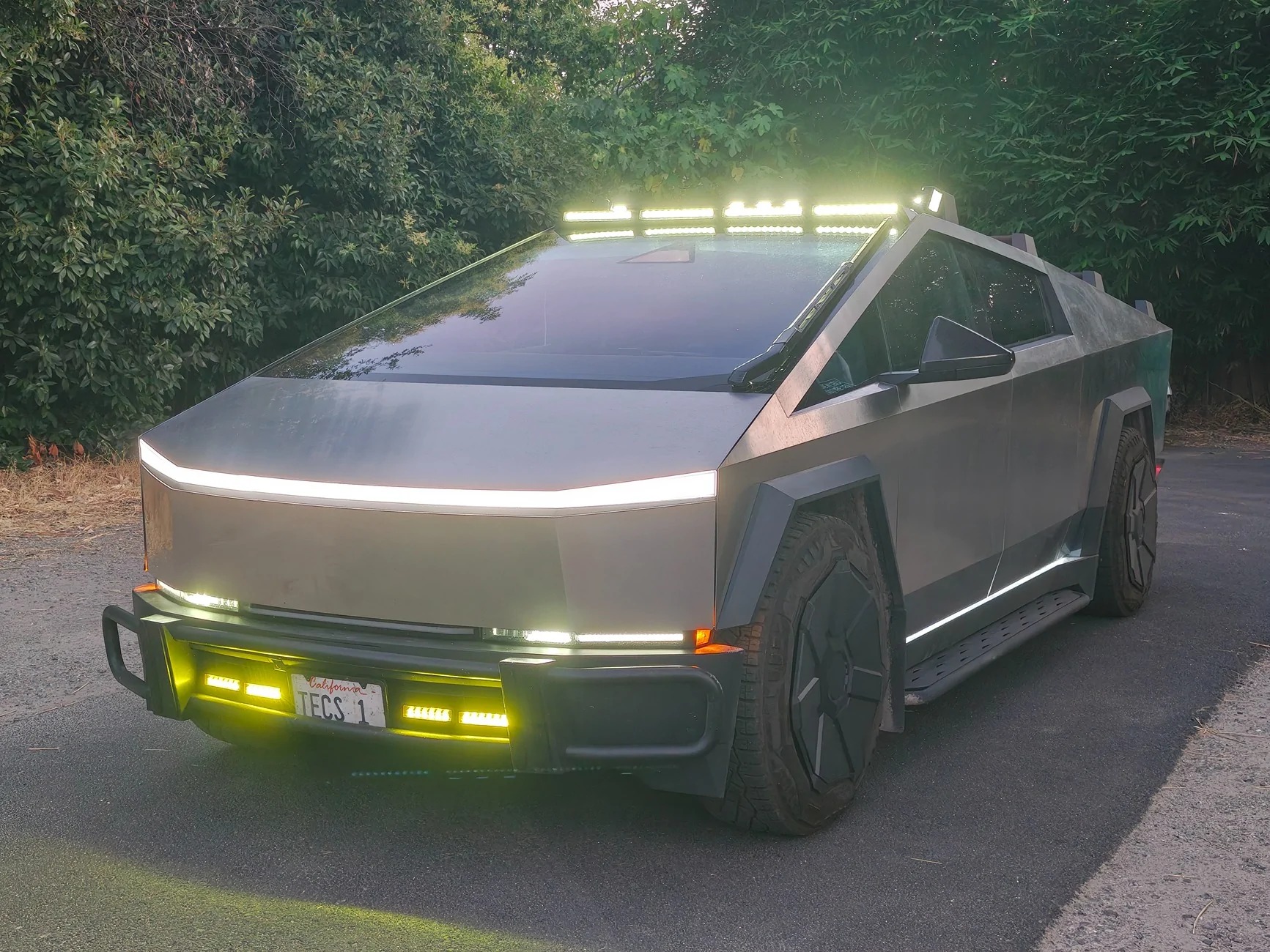 Tesla Cybertruck with headlights on