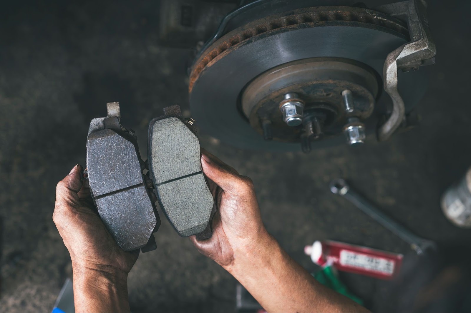 Two worn brake pads