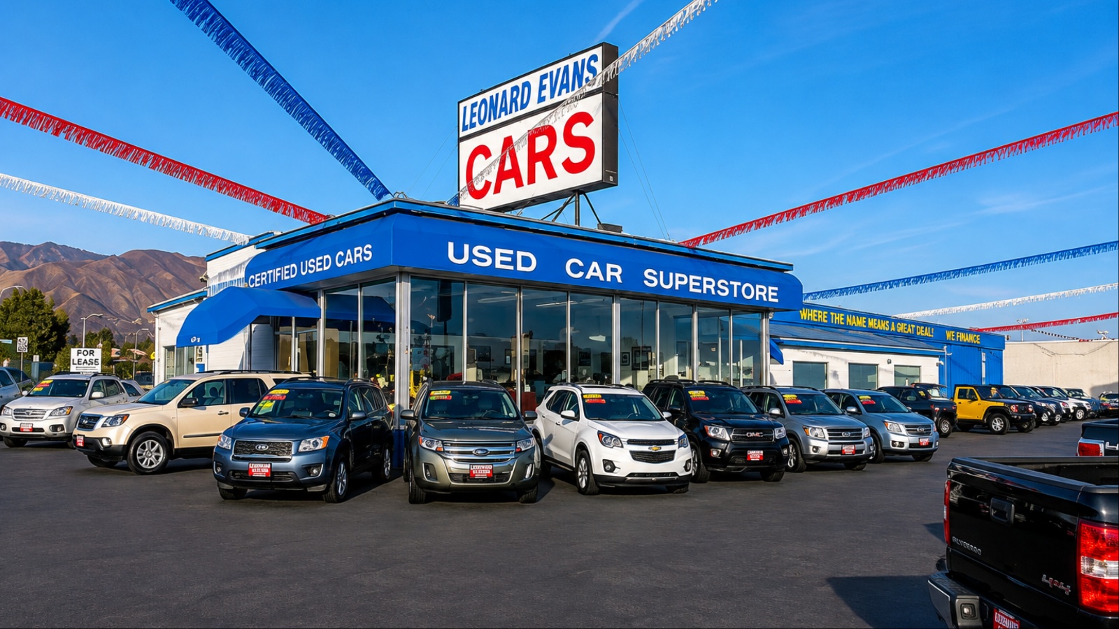 A car dealership is surrounded for cars to sell