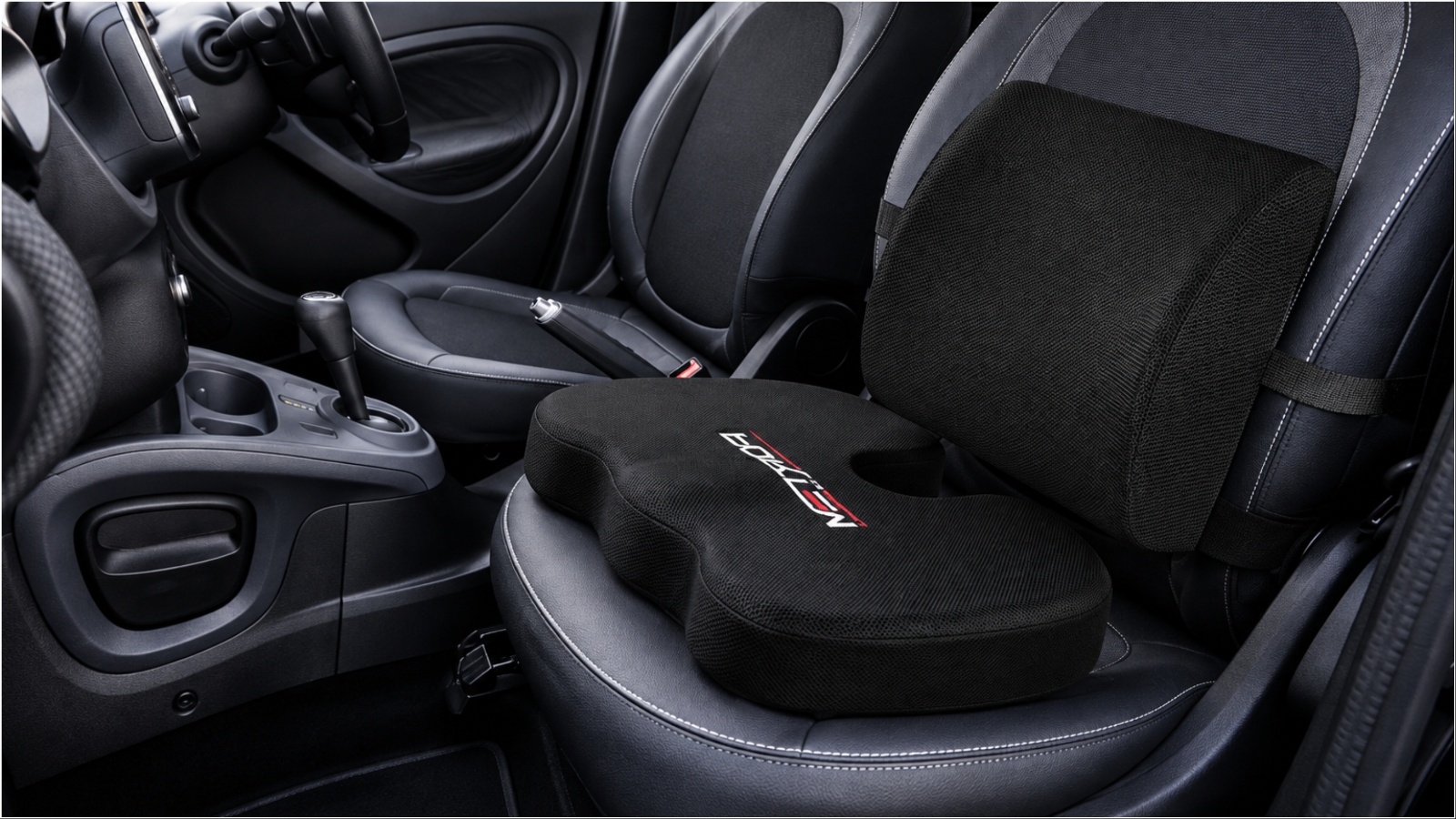 Car seat with orthopedic cushion and lumbar support pillow installed