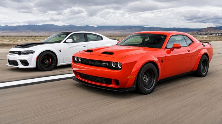 Dodge Challenger and Dodge Charger are racing each other on a race course