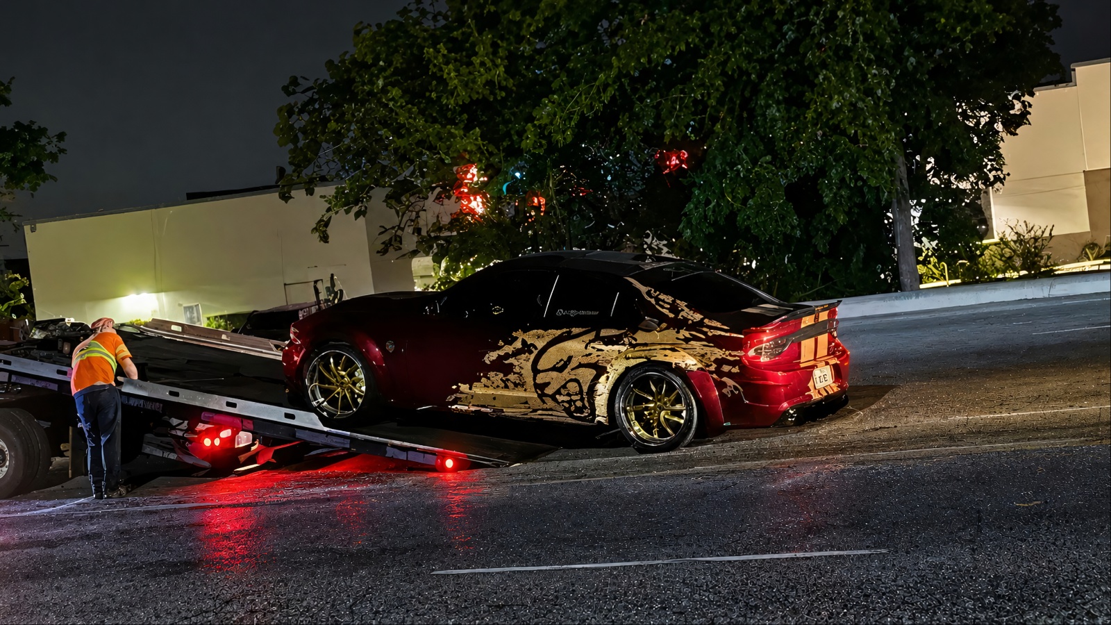 Dodge Charger SRT Hellcat Widebody being loaded onto a flatbed tow truck