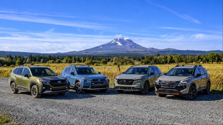 Four popular SUVs parked beneath Mount Rainier in Washington