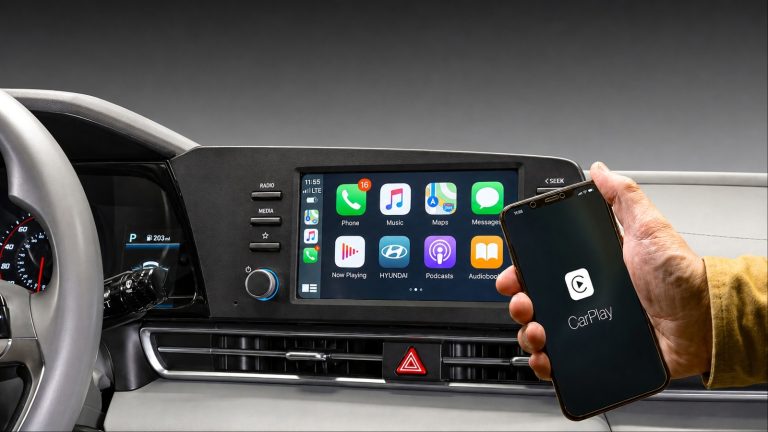 Hyundai infotainment system showing Apple CarPlay connected to a smartphone