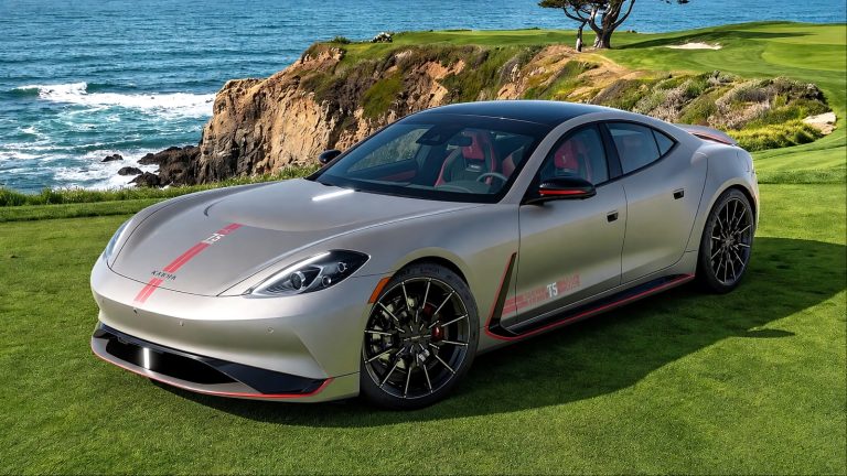A Karma Automotive Gyesera is standing near a lake