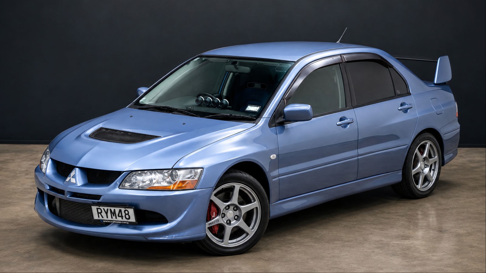 A Lancer 2WD is standing on a flat surface