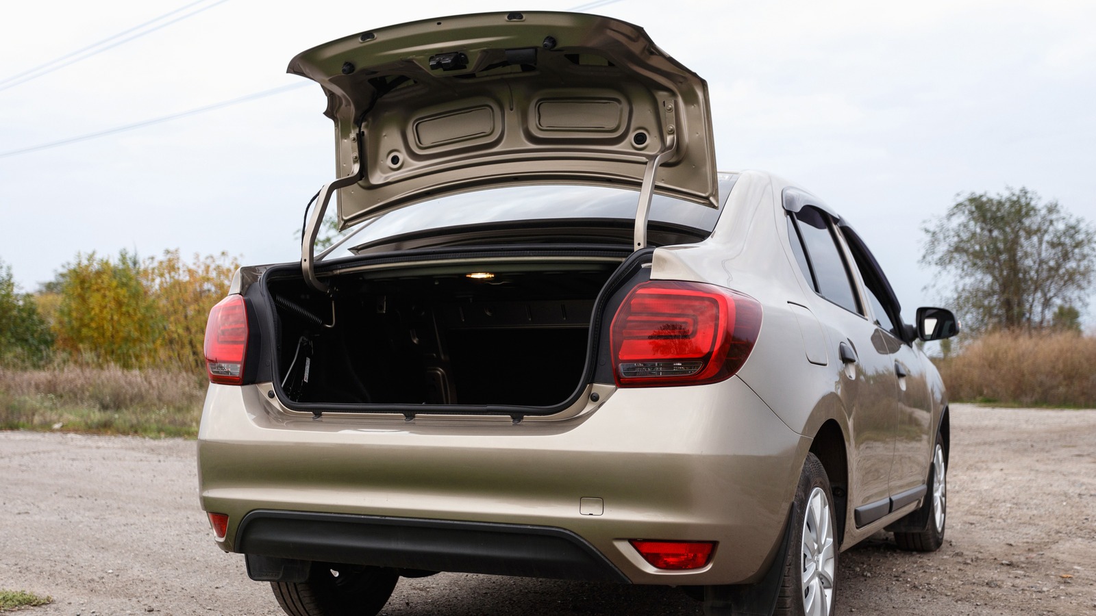 Renault Logan 2020 Golden Color with its rear hatch open