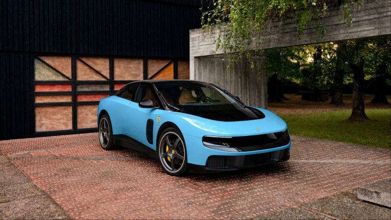 sleek blue Ferrari Luce sits outside a modern architectural residence, blending elegance with futuristic design