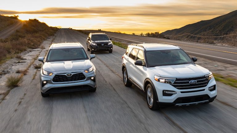 Toyota Highlander, Ford Explorer, and Honda Pilot drive together at sunset