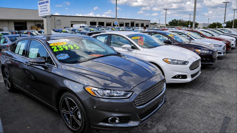 A used-car dealership lot offers shoppers a wide selection of vehicles at competitive prices