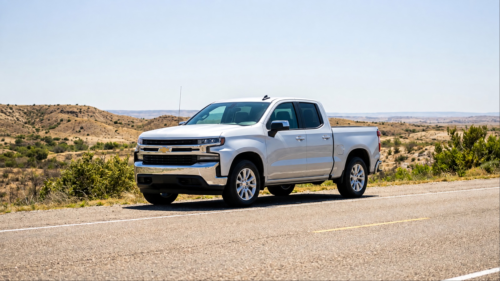 Well-maintained pickup truck parked on a rural Texas road with open countryside views
