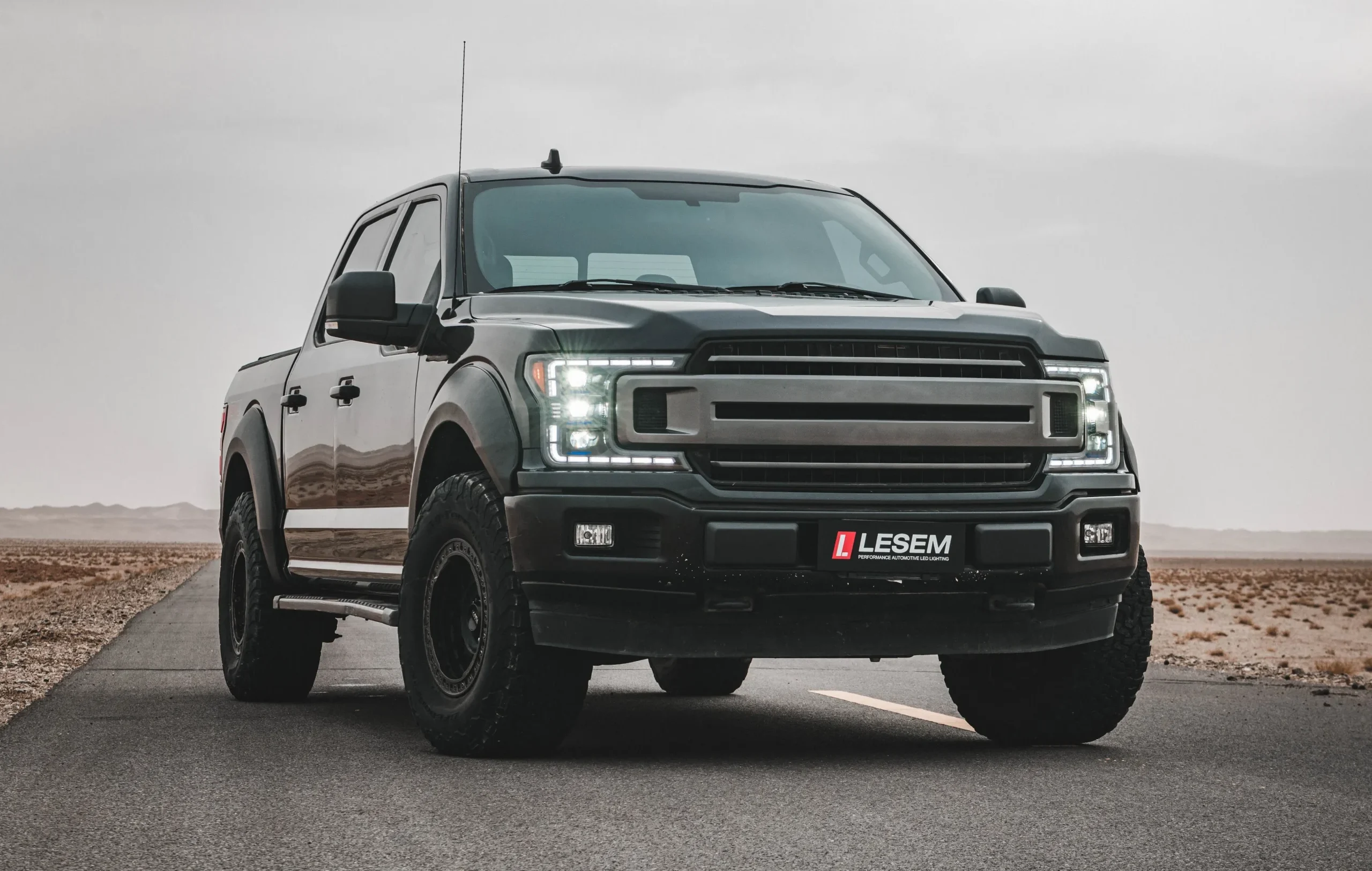 A 4x4 is standing with illegal modifications and headlights