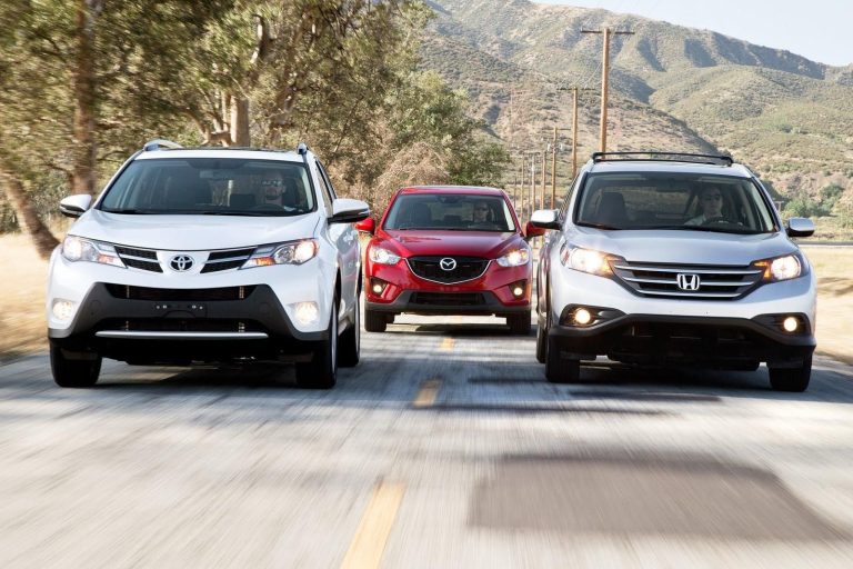 Three SUVs on scenic highway