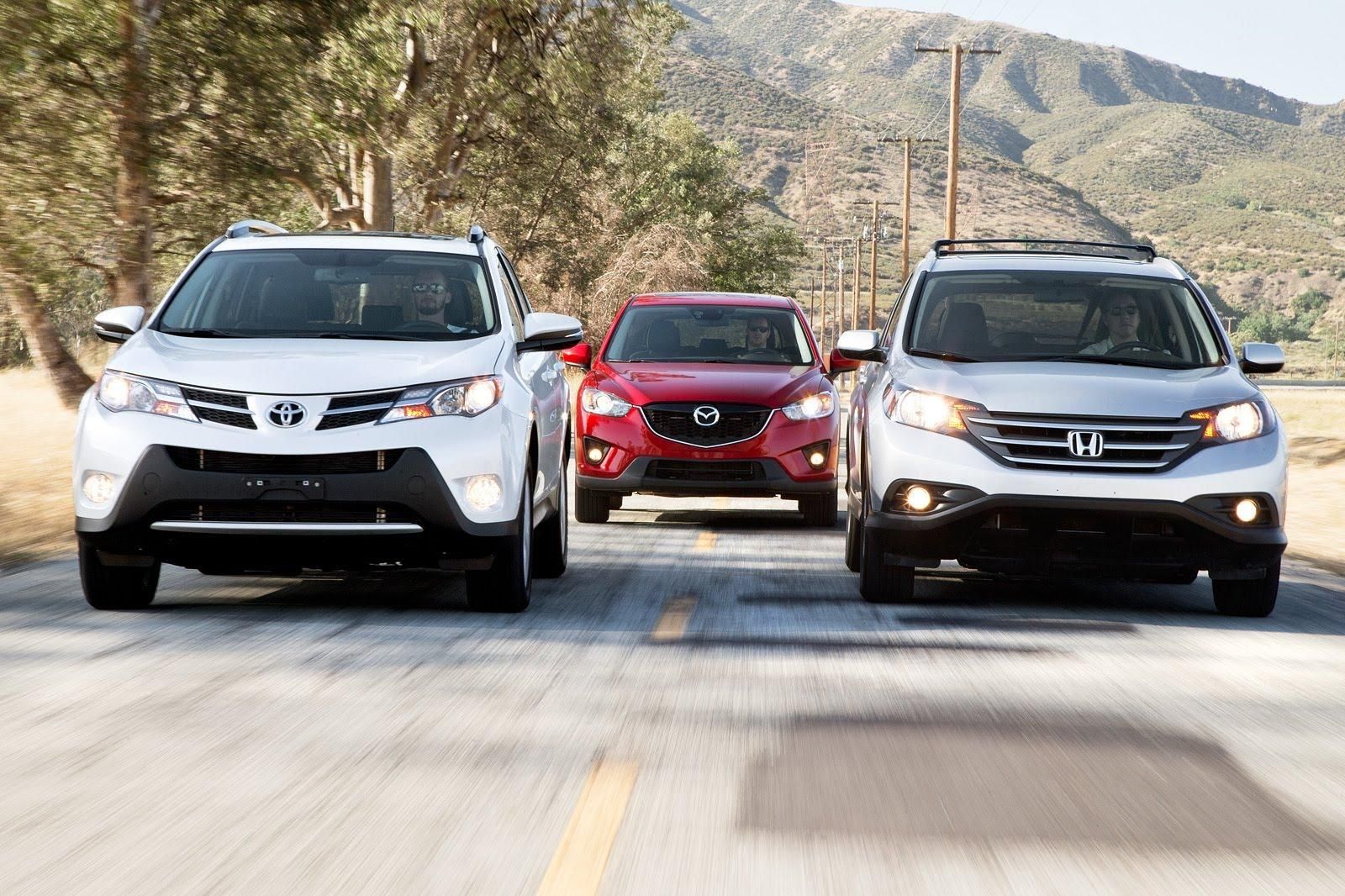 Three SUVs on scenic highway