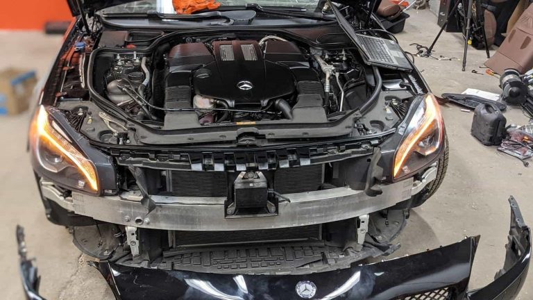 Luxury Car Repair With Removed Bumper