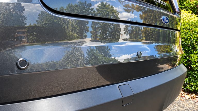 Scratched bumper with parking sensors