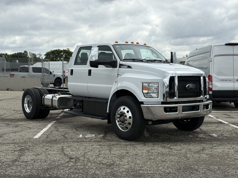 A ford 750 is standing in a parking lot