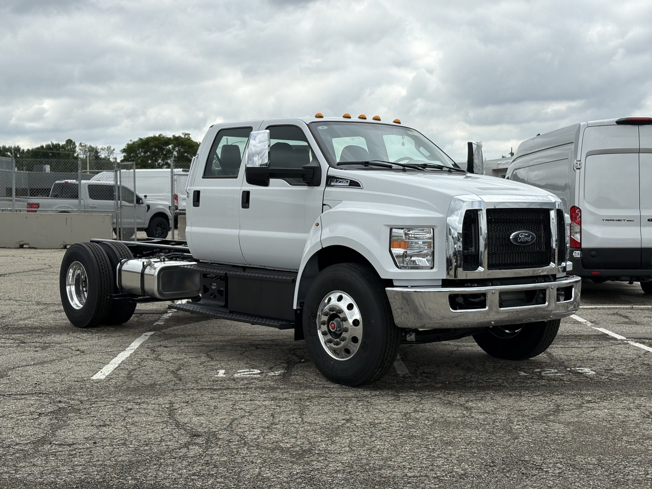 A ford 750 is standing in a parking lot