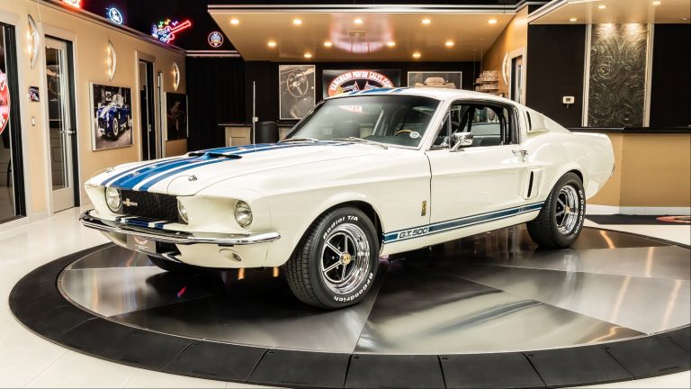 White 1967 Shelby GT500 Super Snake classic car in showroom