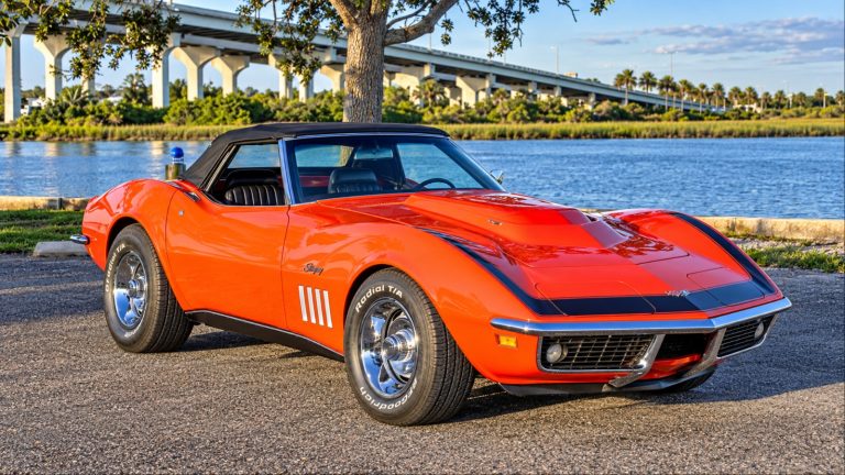 1969 Chevrolet Corvette ZL1 convertible parked beside a scenic waterfront
