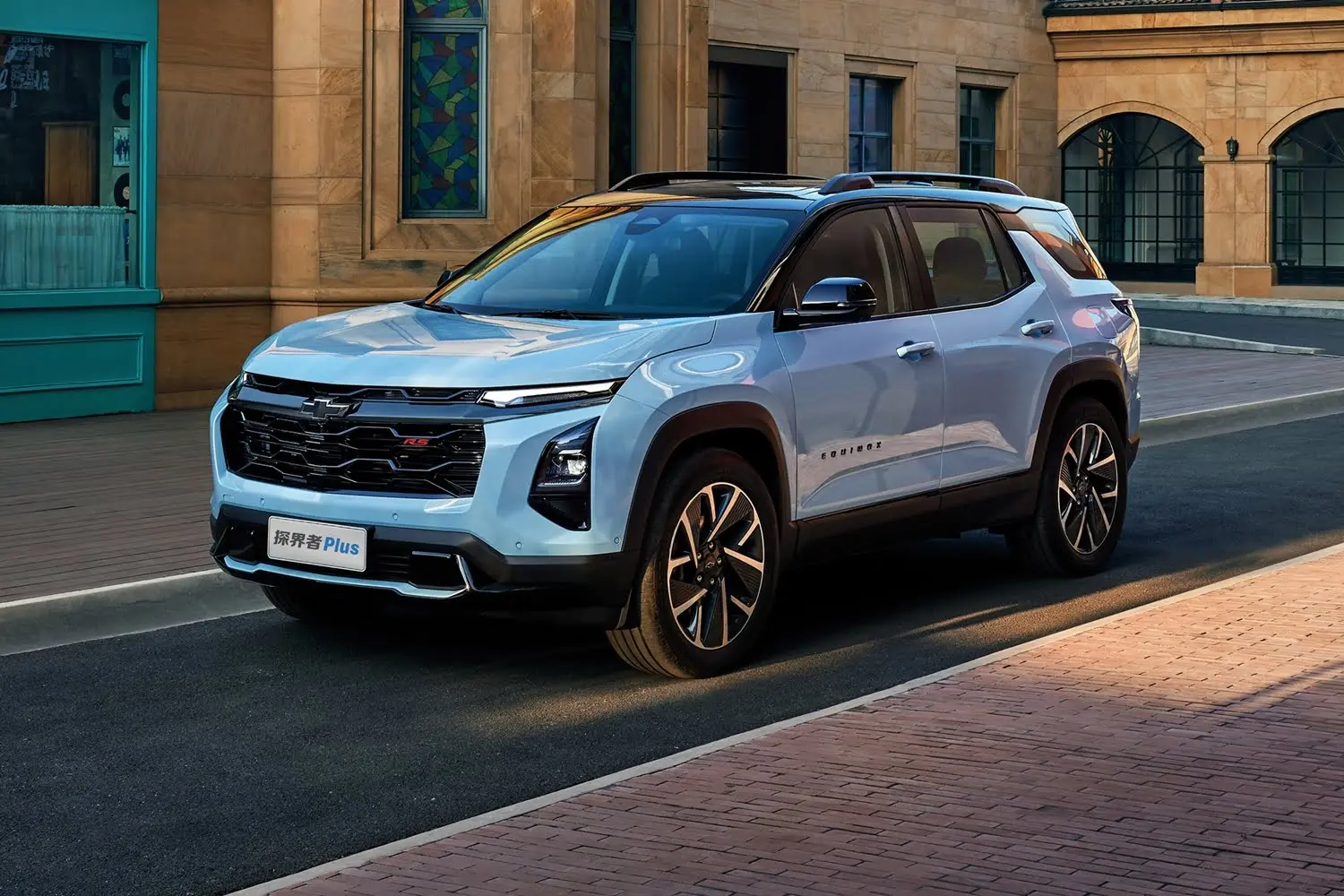 A Chevy Equinox is standing in front of an old building