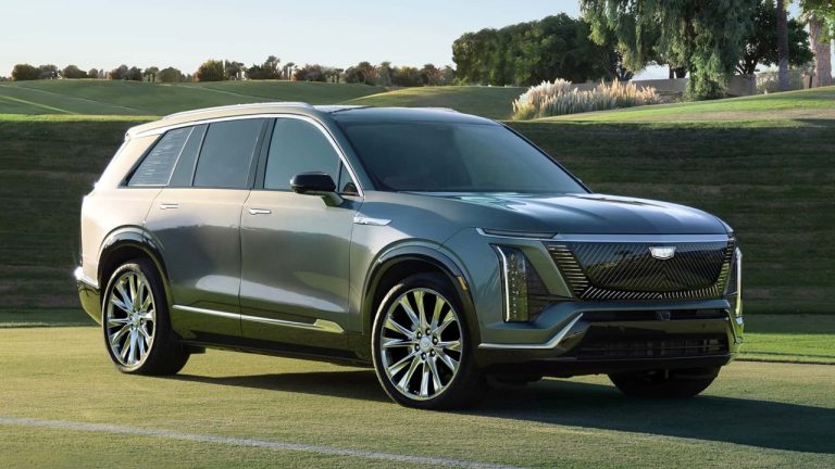 2026 Cadillac Vistiq parked on a golf course at sunset