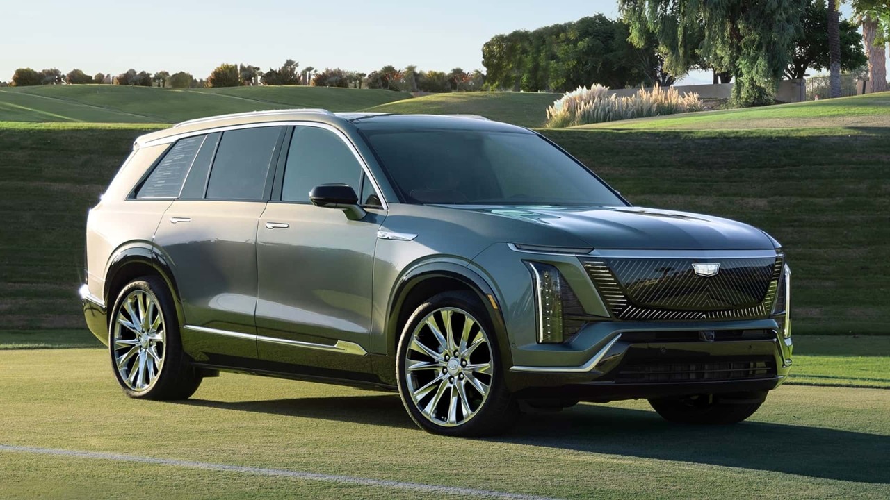 2026 Cadillac Vistiq parked on a golf course at sunset