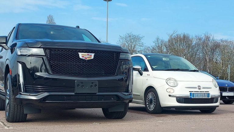 Massive SUV Beside Tiny Hatchback