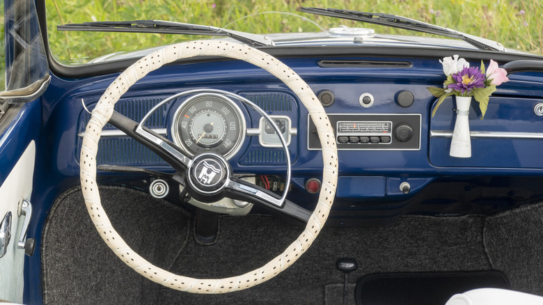 A Dashboard-Mounted Flower Vase